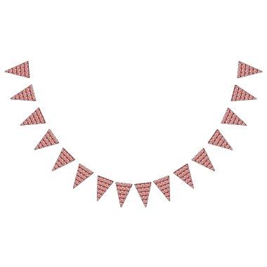 A red rug with a textured pattern is spread out on bunting flags