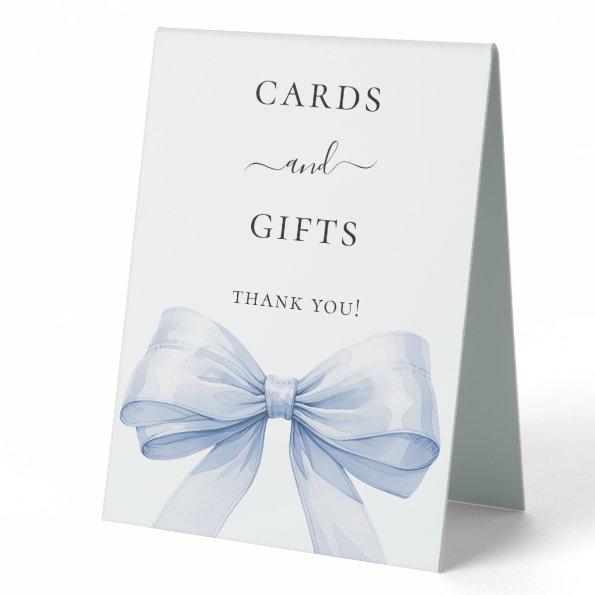 Blue bow white  gifts sign