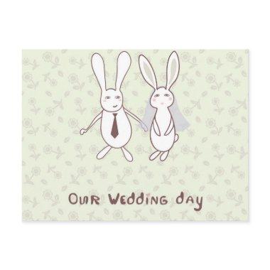 with two cute rabbits in