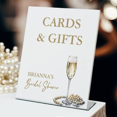 Pearls and prosecco bridal shower gifts sign