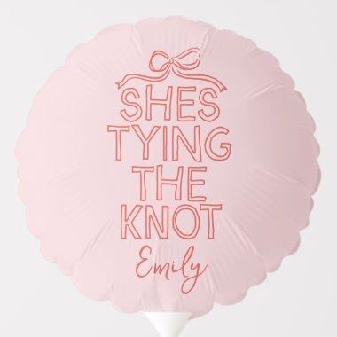 Whimsical coquette bow tying knot  balloon