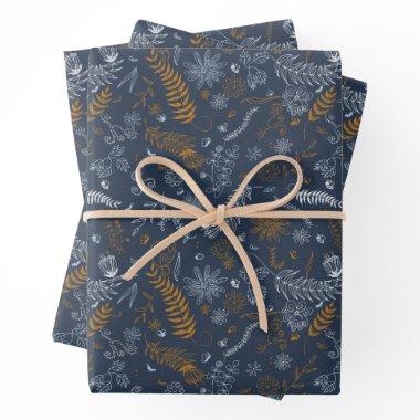 White and golden floral doodles in blue wrapping paper sheets